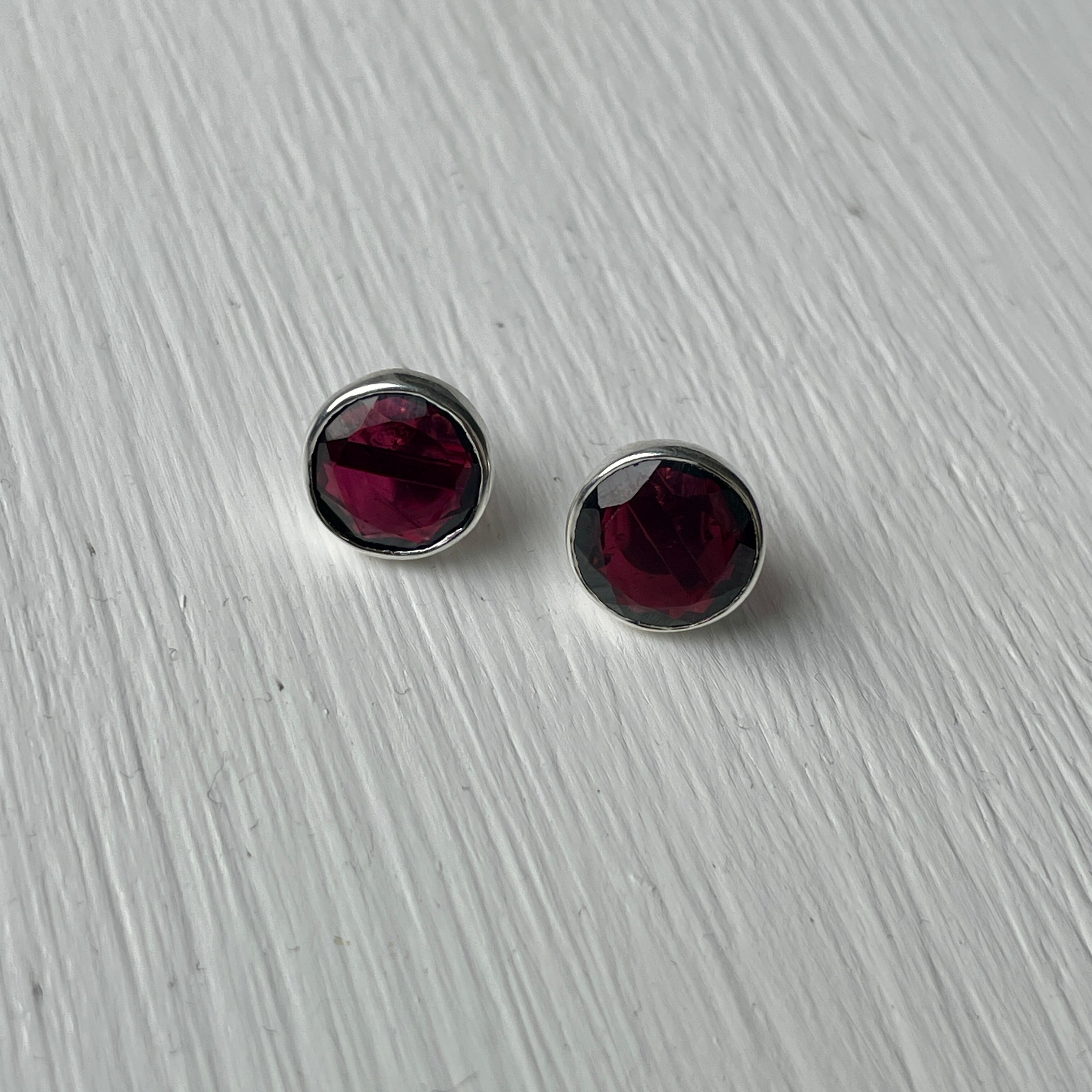 Garnet Studs in Sterling Silver with a Round Faceted Gemstone - Milina London