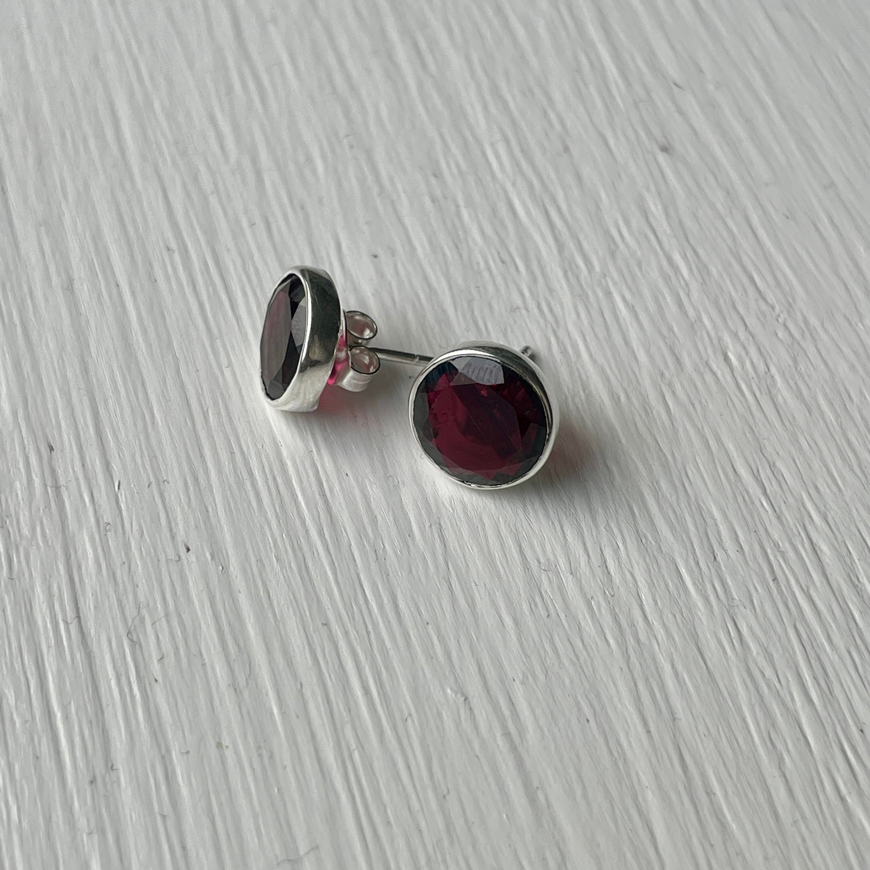 Garnet Studs in Sterling Silver with a Round Faceted Gemstone - Milina London
