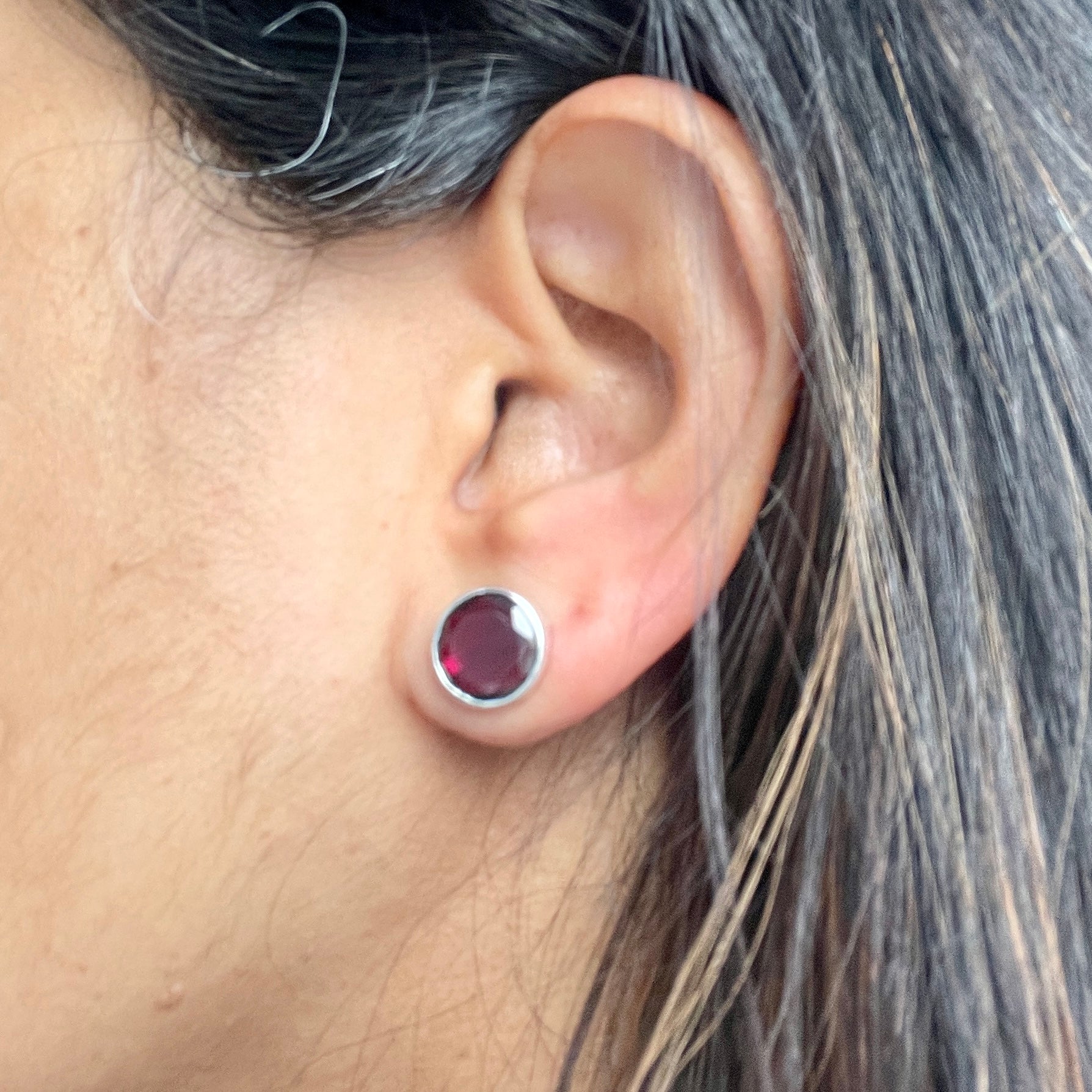 Garnet Studs in Sterling Silver with a Round Faceted Gemstone