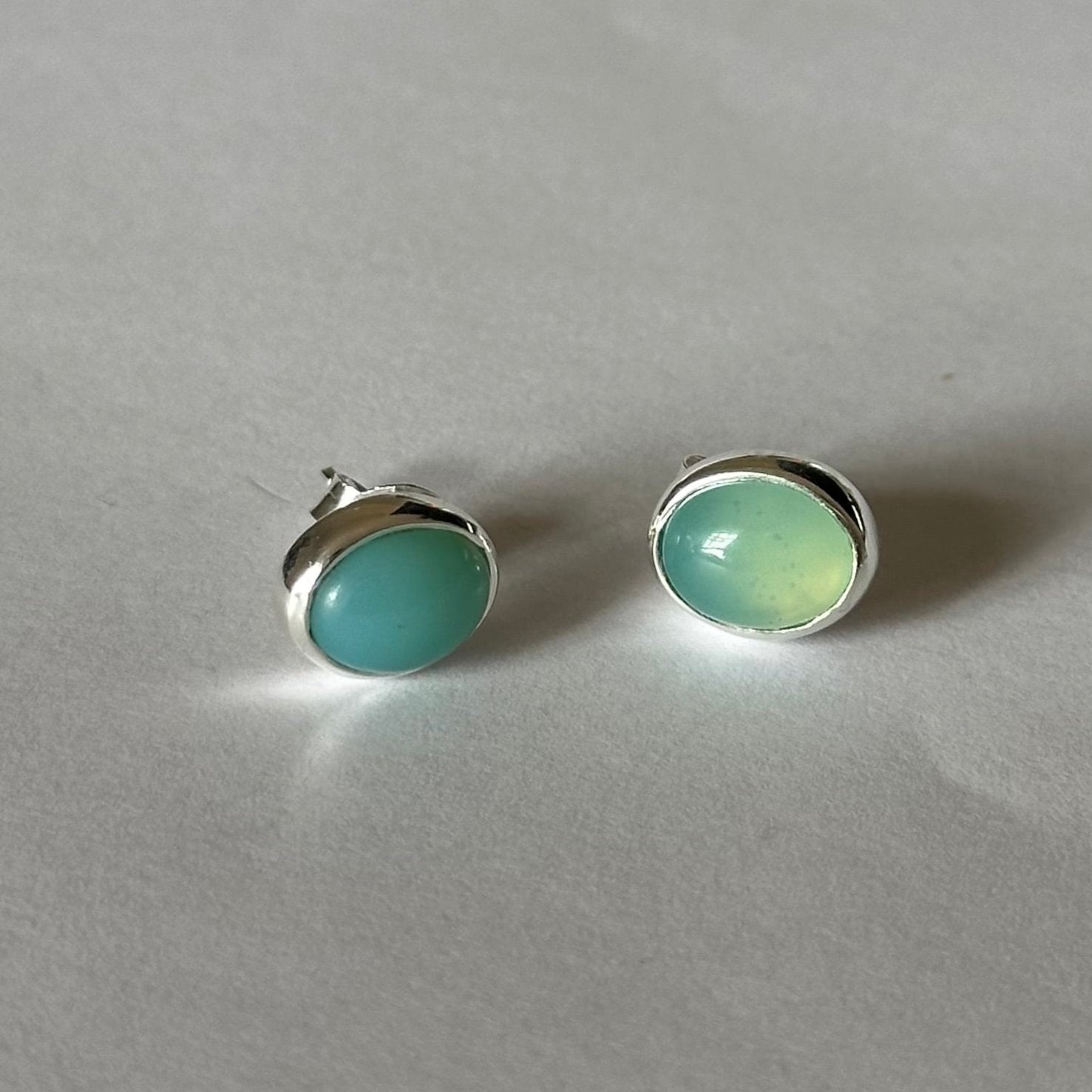 Sterling Silver Oval Stud Earrings with Cabochon Cut Aqua Chalcedony Gemstone - Milina London