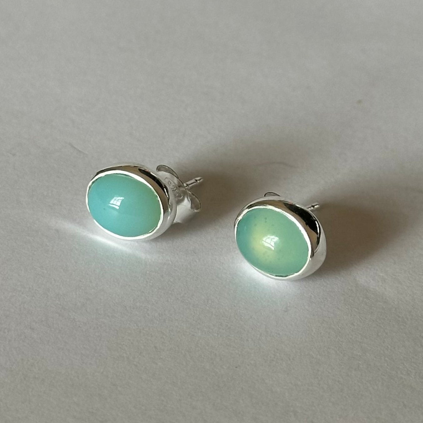 Sterling Silver Oval Stud Earrings with Cabochon Cut Aqua Chalcedony Gemstone - Milina London