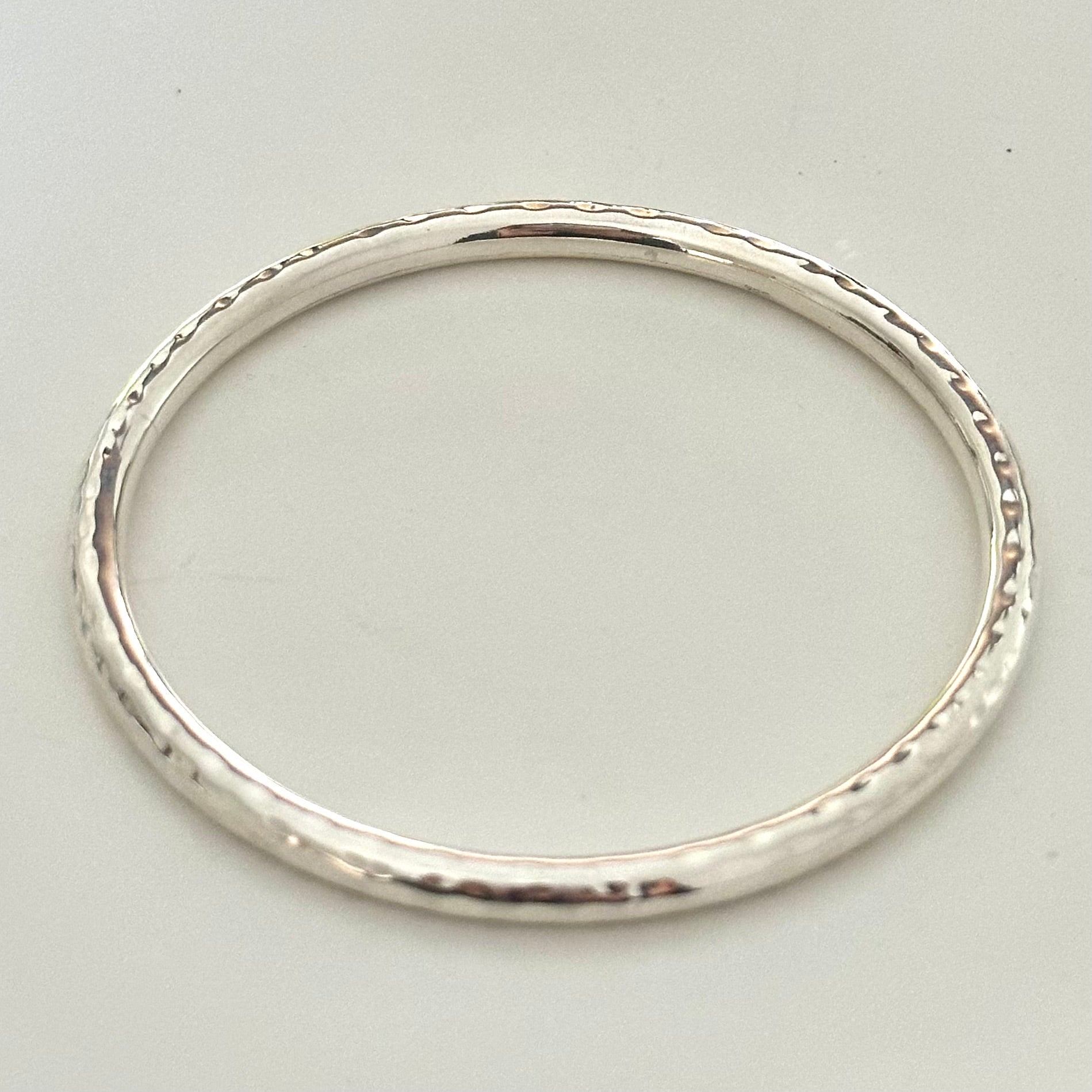 Sterling Silver Narrow Hammered Bangle - Milina London