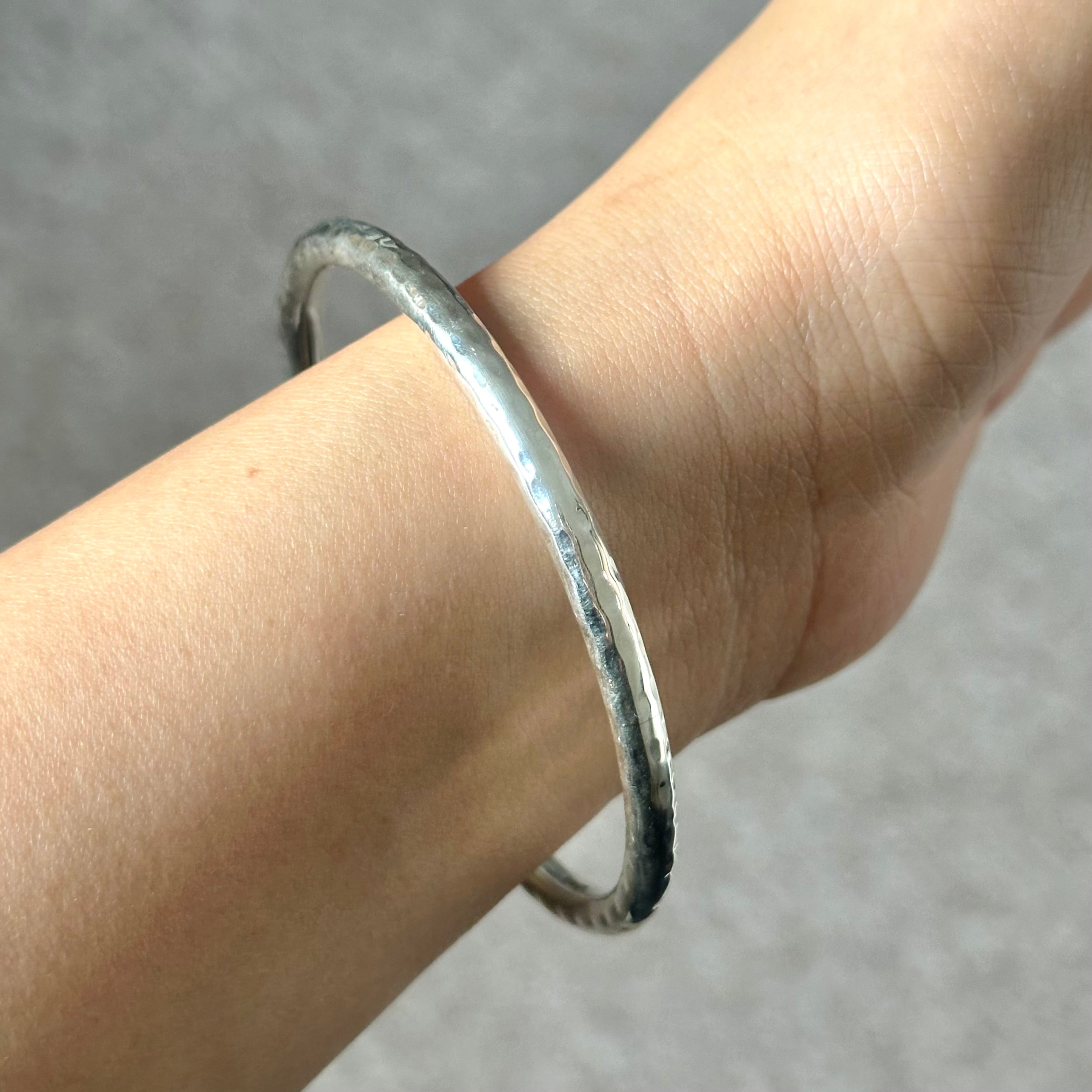 Sterling Silver Narrow Hammered Bangle - Milina London