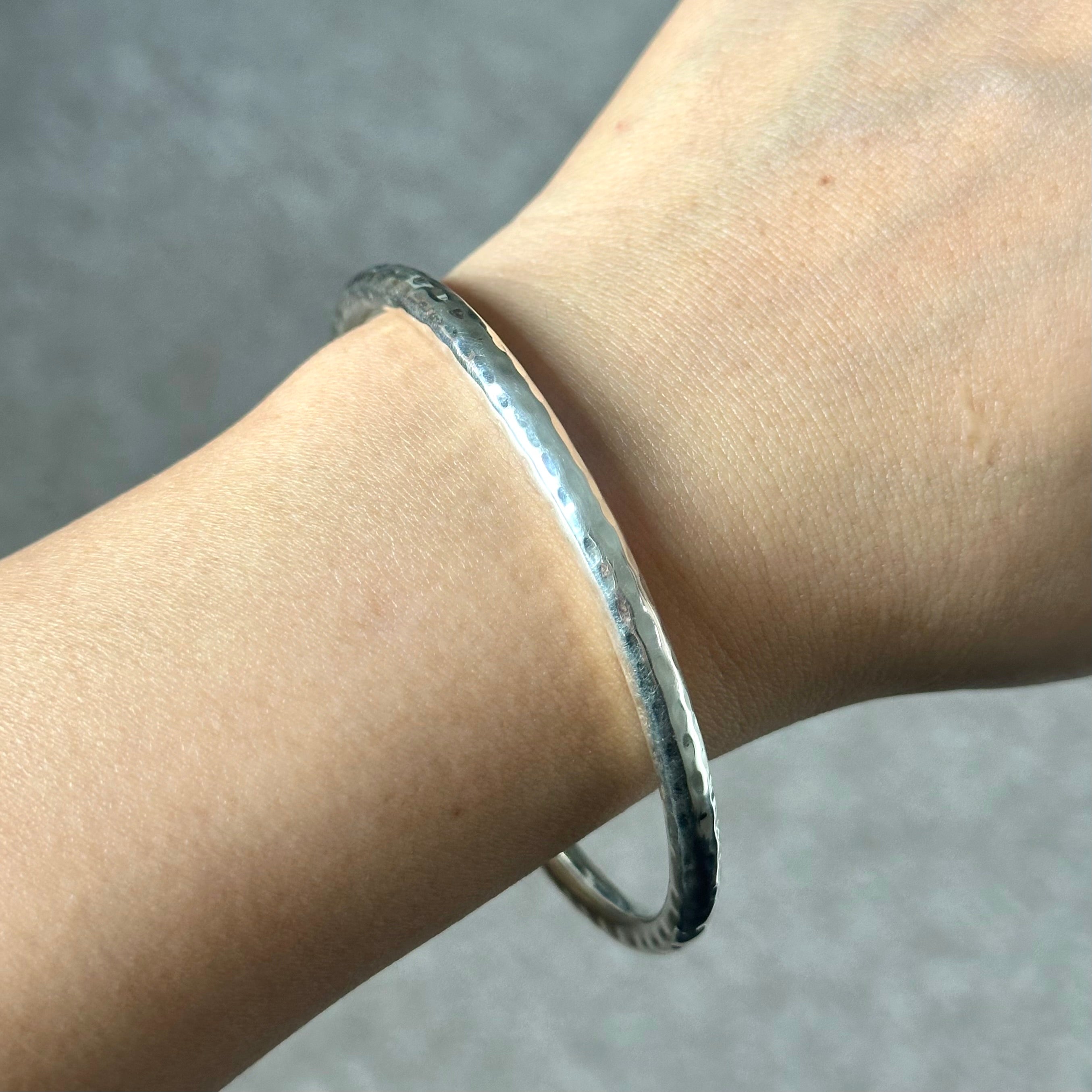 Sterling Silver Narrow Hammered Bangle - Milina London