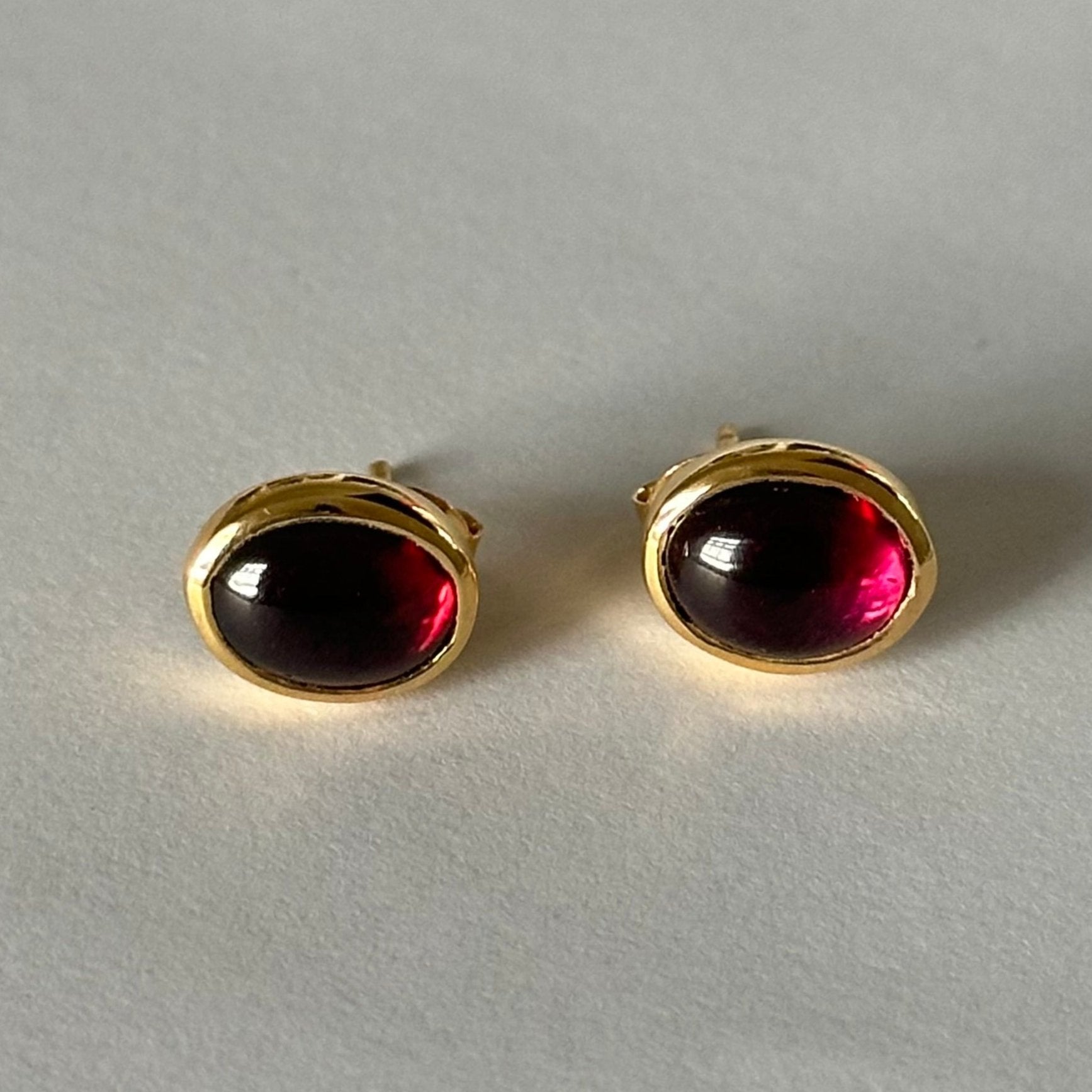 Gold Plated Sterling Silver Oval Stud Earrings with Cabochon Cut Garnet Gemstone - Milina London