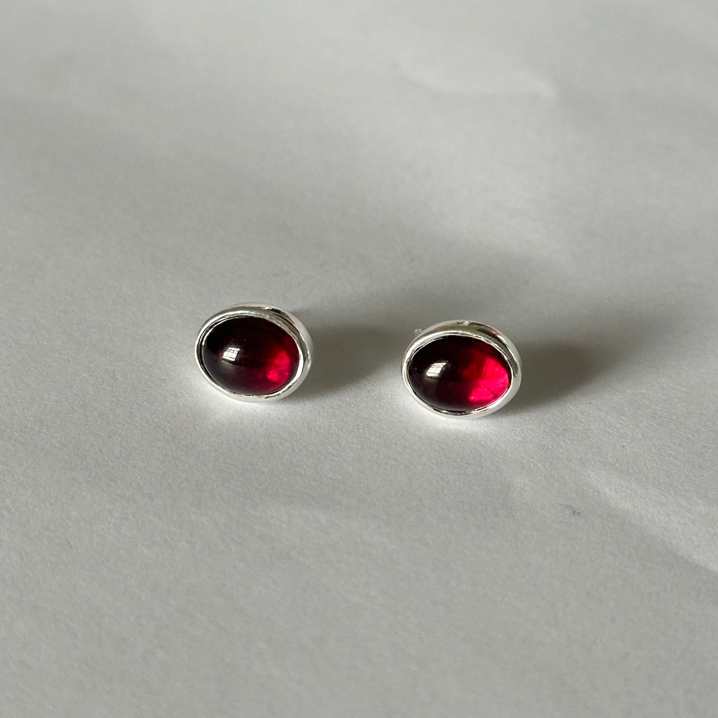 Sterling Silver Oval Stud Earrings with Cabochon Cut Garnet Gemstone - Milina London 