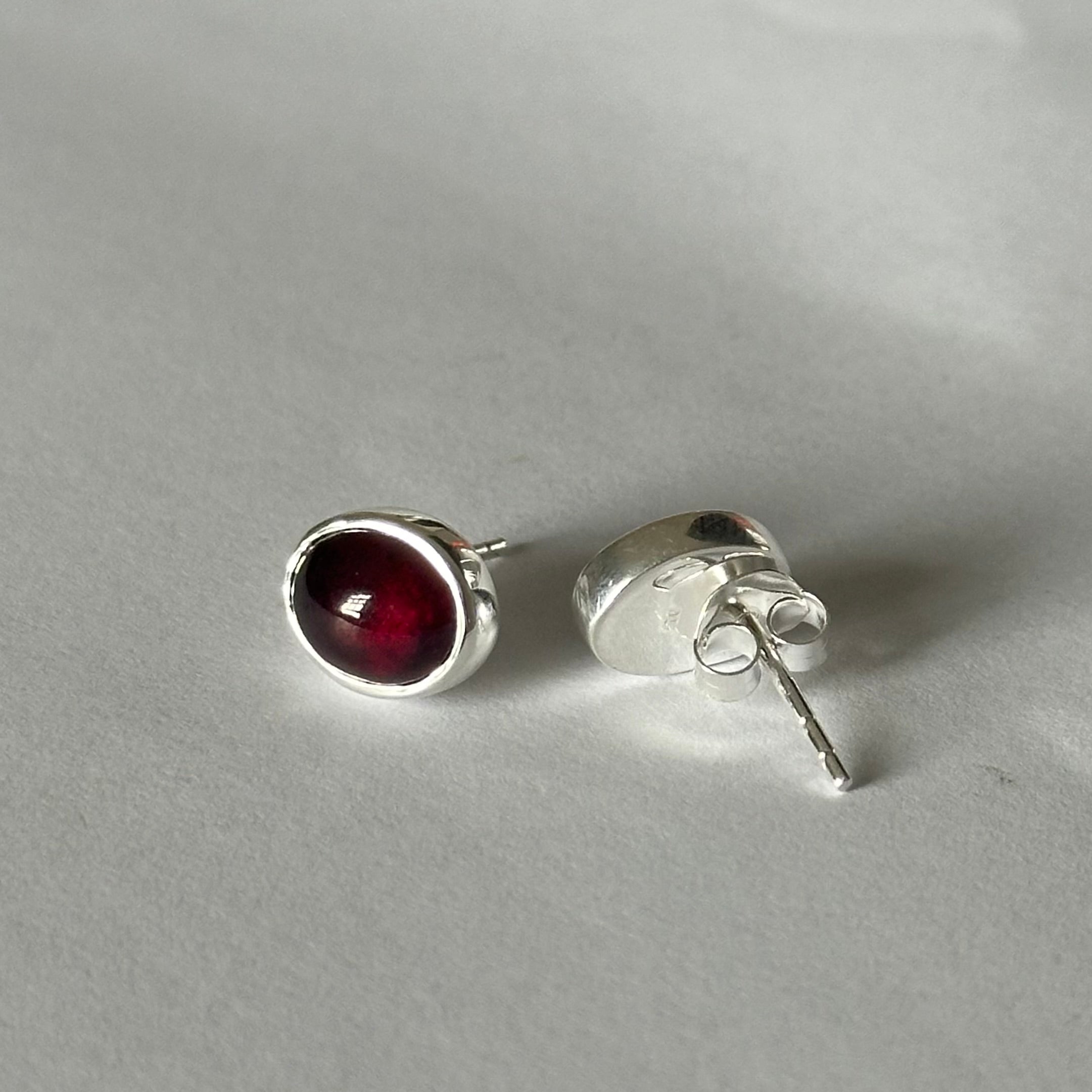 Sterling Silver Oval Stud Earrings with Cabochon Cut Garnet Gemstone - Milina London 