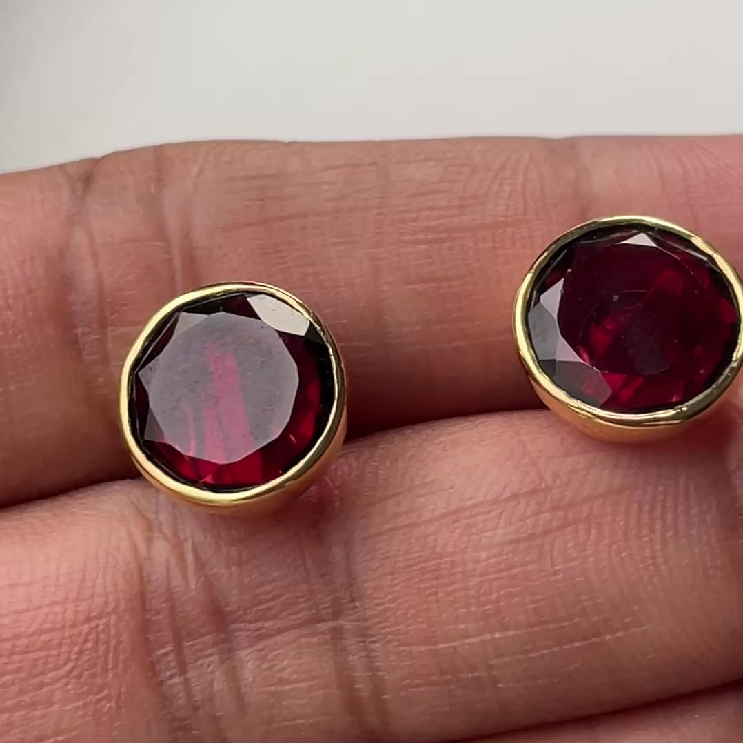 Garnet Studs in Gold Plated Sterling Silver with a Round Faceted Gemstone