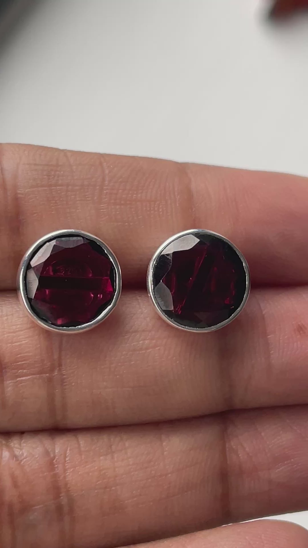 Garnet Studs in Sterling Silver with a Round Faceted Gemstone